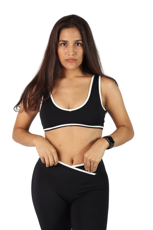 Top deportivo negro con línea blanca - Edge